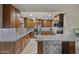 Modern kitchen with custom cabinetry, quartz countertops, and stainless steel appliances at 1422 E Royal Palm Rd, Phoenix, AZ 85020