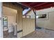 Exterior bathroom with a pedestal sink, toilet, and convenient access from the backyard at 1422 E Royal Palm Rd, Phoenix, AZ 85020