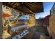 Well-equipped outdoor kitchen and dining area with built-in grill and scenic views, ideal for entertaining at 1422 E Royal Palm Rd, Phoenix, AZ 85020