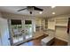 Well-lit walk-in closet with custom shelving and French doors to a private outdoor patio at 1422 E Royal Palm Rd, Phoenix, AZ 85020