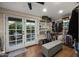 Spacious walk-in closet featuring wood floors, ample shelving, and natural light at 1422 E Royal Palm Rd, Phoenix, AZ 85020