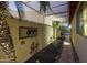 Landscaped walkway featuring decorative lighting, lush greenery, and privacy screens at 1422 E Royal Palm Rd, Phoenix, AZ 85020