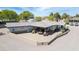 Aerial view showcases a large outdoor patio with ample seating, lush landscaping, and convenient parking at 15218 E San Tan Blvd, Gilbert, AZ 85298
