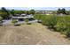 Large, grassy fenced-in yard featuring mature trees and a well-maintained single-story home at 15218 E San Tan Blvd, Gilbert, AZ 85298