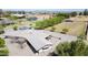 Estate aerial featuring expansive property, horse facilities, covered patios, and desert landscaping at 15218 E San Tan Blvd, Gilbert, AZ 85298