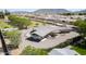 Expansive estate featuring custom home, horse facilities, and lush landscaping, with mountain views at 15218 E San Tan Blvd, Gilbert, AZ 85298