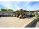 Expansive backyard with covered patio, outdoor seating, and lush landscaping, perfect for entertaining at 15218 E San Tan Blvd, Gilbert, AZ 85298
