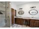 Bathroom features granite counters, dual sinks, vanity, wood accents, and glass shower at 15218 E San Tan Blvd, Gilbert, AZ 85298