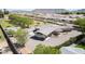 Aerial view captures the home and adjacent neighborhood, set against a backdrop of mountains at 15218 E San Tan Blvd, Gilbert, AZ 85298