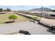 Aerial view of property showing the gated entrance, fence line, and mountain backdrop at 15218 E San Tan Blvd, Gilbert, AZ 85298