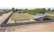 Aerial of horse facilities with shaded areas, and block construction at 15218 E San Tan Blvd, Gilbert, AZ 85298