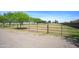 Fenced in portion of the property with mature trees at 15218 E San Tan Blvd, Gilbert, AZ 85298