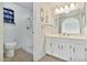 Bathroom features a shower with glass doors, and a white sink with vanity at 1684 Leisure World --, Mesa, AZ 85206