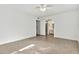 Bedroom with neutral flooring leading to the bathroom in the Primary suite at 1684 Leisure World --, Mesa, AZ 85206
