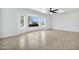 Bright living room with tile floors, ceiling fan and large windows providing lots of light at 1684 Leisure World --, Mesa, AZ 85206