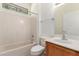Bathroom features vanity with sink, toilet and tub with shower at 16902 W Marcos De Niza Dr, Surprise, AZ 85387