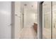 Bathroom featuring tiled floor and a glass shower at 16902 W Marcos De Niza Dr, Surprise, AZ 85387