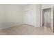 Bedroom with closet space and tiled flooring at 16902 W Marcos De Niza Dr, Surprise, AZ 85387