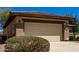 View of house with private two car garage at 16902 W Marcos De Niza Dr, Surprise, AZ 85387