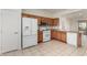 Modern kitchen with granite countertops, stainless steel appliances, and ample cabinet space for storage at 16902 W Marcos De Niza Dr, Surprise, AZ 85387