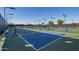 Well-maintained pickleball courts offer a great recreational space for residents at 16902 W Marcos De Niza Dr, Surprise, AZ 85387