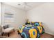 Bedroom featuring a ceiling fan, natural light, a chair, and carpet floors at 1705 W Stephanie Ln, San Tan Valley, AZ 85144