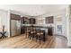 Well-equipped kitchen with an island, stainless steel appliances, and sleek dark wood cabinets at 1705 W Stephanie Ln, San Tan Valley, AZ 85144