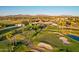 Aerial view of the golf course with club house and surrounding landscaping at 1750 N Abner --, Mesa, AZ 85205