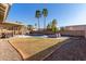 Spacious backyard with pool, patio, and grassy area, great for entertaining at 1750 N Abner --, Mesa, AZ 85205