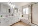 Stylish bathroom with double sinks, a soaking tub, and a separate shower at 1750 N Abner --, Mesa, AZ 85205