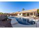Backyard view of the pool with covered patio in the background at 1750 N Abner --, Mesa, AZ 85205