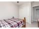 Bedroom featuring a full size bed and sliding closet doors at 21647 S 223Rd Pl, Queen Creek, AZ 85142