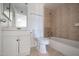This bathroom offers a tub shower and a vanity sink at 2646 N 43Rd Ave # B, Phoenix, AZ 85009