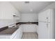 Functional kitchen with white appliances and ample cabinet storage at 2646 N 43Rd Ave # B, Phoenix, AZ 85009