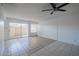 The bright living room boasts tile flooring and access to outdoor patio space at 2646 N 43Rd Ave # B, Phoenix, AZ 85009