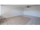 A spacious living room with tile flooring and a ceiling fan at 2646 N 43Rd Ave # B, Phoenix, AZ 85009