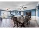 Large dining space with wainscoting, and bright natural light at 2962 E Dolphin Ave, Mesa, AZ 85204