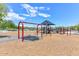 Community playground featuring swings, slides, and climbing structures, perfect for entertainment at 29674 N 127Th Ln, Peoria, AZ 85383