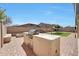 Backyard featuring a built in grill, travertine patio, and a pergola at 3005 W Donatello Dr, Phoenix, AZ 85086