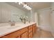 Bathroom featuring double sinks and a shower with a tub at 3005 W Donatello Dr, Phoenix, AZ 85086