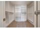 Walk-in closet with custom shelving and ample space for organization at 3005 W Donatello Dr, Phoenix, AZ 85086