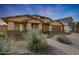 Beautiful single-Gathering home with a three car garage, desert landscaping, and a brick paver driveway at 3005 W Donatello Dr, Phoenix, AZ 85086