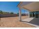 Wide view of the backyard featuring a covered patio and space for customization at 35658 N Lodestone Dr, San Tan Valley, AZ 85144