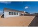 Bright backyard featuring ample space, block wall, and covered patio, great for customization at 35658 N Lodestone Dr, San Tan Valley, AZ 85144