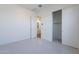 Bright bedroom features plush carpet, closet with sliding doors, and neutral paint at 35658 N Lodestone Dr, San Tan Valley, AZ 85144
