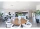 Open layout showcases dining and living areas with abundant natural light and style at 35658 N Lodestone Dr, San Tan Valley, AZ 85144