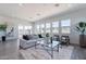 Bright and airy living room featuring lots of natural light and stylish furnishings at 35658 N Lodestone Dr, San Tan Valley, AZ 85144