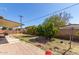 Backyard featuring brick paver patio and several orange trees at 3727 W Gardenia Ave, Phoenix, AZ 85051