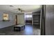 This living room boasts hardwood floors, an open layout, and tons of natural light at 3727 W Gardenia Ave, Phoenix, AZ 85051