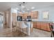 Well-equipped kitchen featuring a spacious island, modern appliances, and ample cabinet space, perfect for cooking at 42711 N 43Rd Dr, New River, AZ 85087